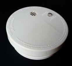 Smoke detectors use a combination of technology to identify fires by detecting smoke particles in the environment